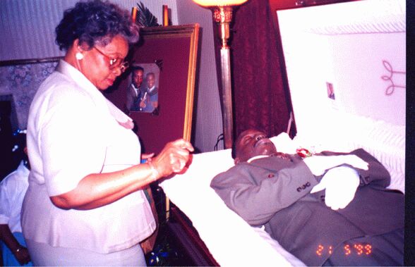 Mom at the side of the coffin